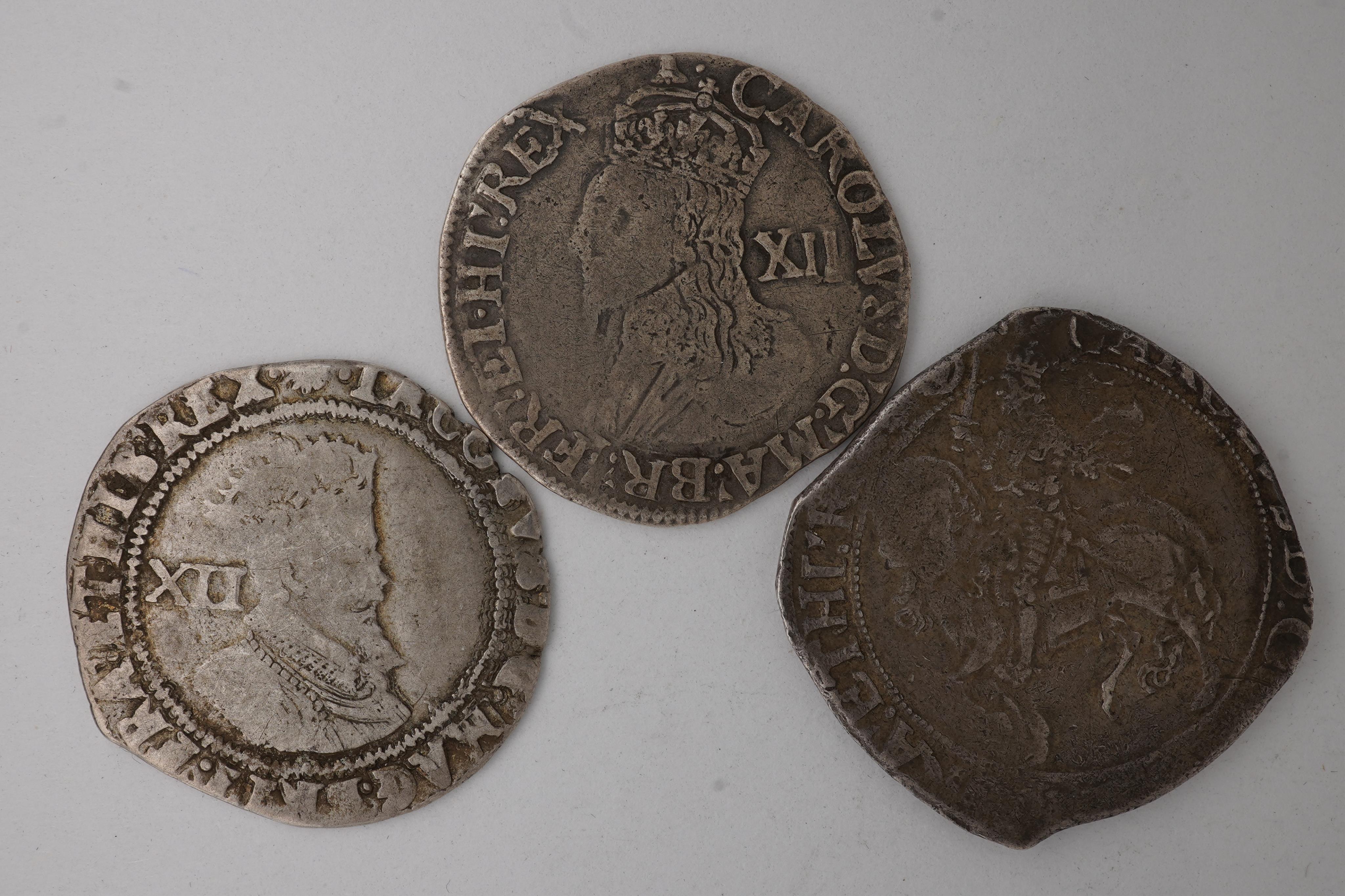 Three British hammered silver coins, House of Stuart, Charles I (1625-1649), silver halfcrown, S. 2779, irregular flan, fine, and, silver shilling, mm. bell, fine, James I (1603-1625), silver shilling, Middleham hoard, S